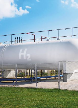 Large hydrogen storage tank labeled with H2 standing for Enapters green hydrogen solutions